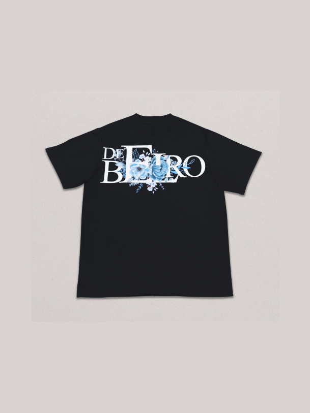 De’Belro Floral Emblem Tee – Black (Blue Bloom Edition)