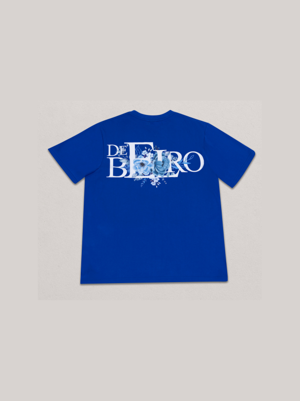 De’Belro Floral Emblem Tee – Royal Blue (Blue Bloom Edition)