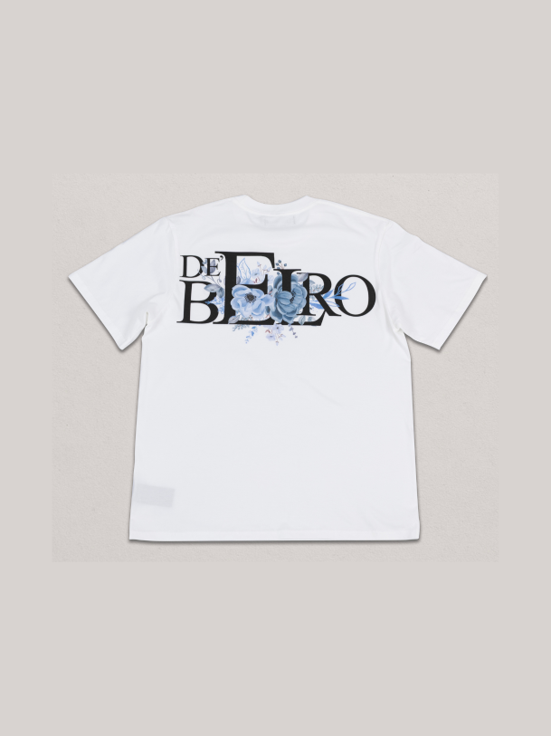 De’Belro Floral Emblem Tee – White (Blue Bloom Edition)